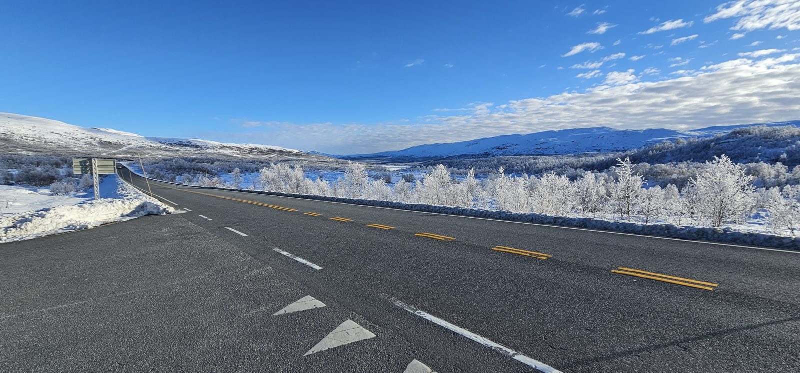 A road running through high frosted country